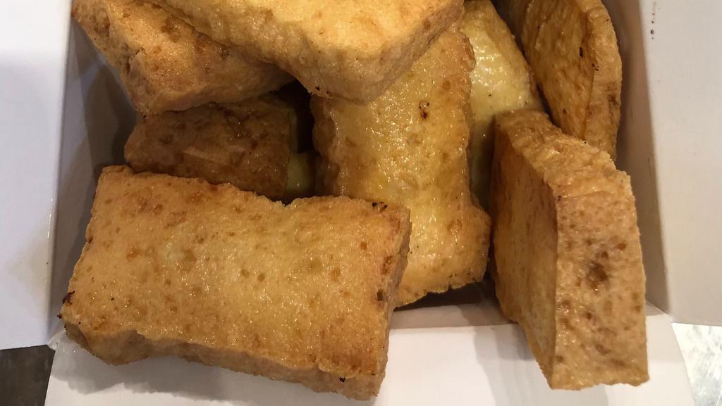 Fried Tofu · 8. Gluten free. Vegetarian. Golden fried tofu served with sweet and sour sauce and golden peanuts.
