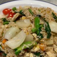 Thai Fried Rice · Gluten free. Vegetarian. Fried rice with choice of meat, egg, onions, cherry tomatoes, peas ...