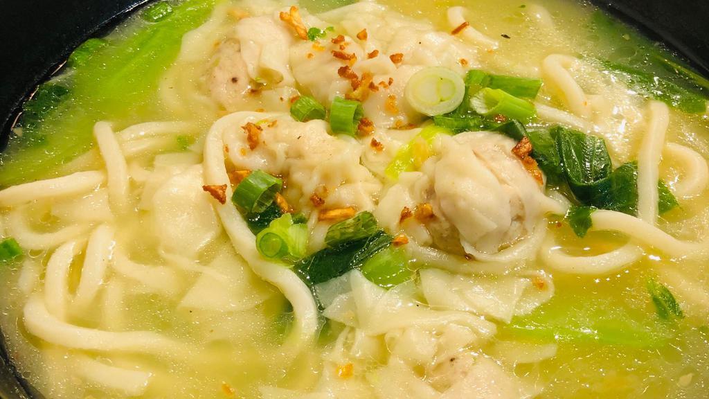 Chicken Wonton Noodle Soup  · Chicken wonton in clear broth with bok choy ,udon noodle,topped with cilantro and fried garlic