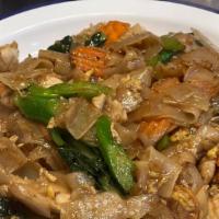 Pad See Ew · Wide size rice noodles with choice of meat, egg, Chinese broccoli, and carrots.