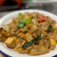 Drunken Noodle · Wide size rice noodles with choice of meat, egg, onions, garlic and chili, bell peppers, and...