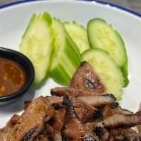 Thai Bbq Pork Grilled · Char-grilled pork with smoked chili and tamarind sauce. Served with jasmine rice. Gluten free.