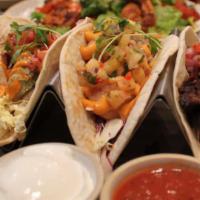 Taco Platter · Three house tacos, sour cream, guacamole, salsa.