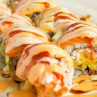 Geisha Roll · Shrimp tempura, crabmeat, cucumber with salmon & avocado on top with 4 kinds of sauce.
