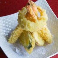 Shrimp Tempura Bento · Lightly fried shrimps and vegetables, 4 pieces California roll, House salad with ginger dres...