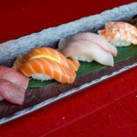 Sushi Combination · Tuna 2, salmon 2, yellowtail 2, shrimp 2, fresh water eel 2.