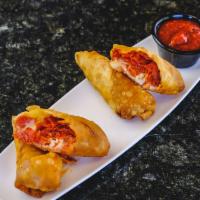 Pizza Egg Rolls · Mozzarella, pepperoni, and red sauce with marinara for dipping.