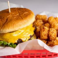 Banzai Burger · 1/2 lb patty, spring mix, American cheese, sautéed onions, tomatoes, pickles, and house BBQ....