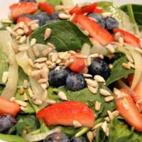 Vegan Berry Spinach Salad · Baby Spinach, Strawberries, Blueberries, Roasted Onions & Sunflower Seeds with Balsamic Popp...