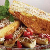 Coconut Cream Stuffed French Toast · Challah Bread dipped in Egg Mix, stuffed with Coconut Cream Cheese & Flaked Coconut, garnish...