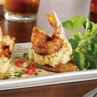 Get Your Grits On · Jumbo Blackened Shrimp or Blackened Salmon  on Fried Green Tomatoes, Stone Ground Grits with...