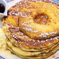 Pineapple Upside Down Pancakes (4) · Four Buttermilk Pancakes with Fresh Pineapple with Cinnamon Sauce