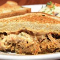 Pratt Street Pulled Pork Bbq Grilled Cheese · House-Made Pulled Pork BBQ with Pimento Cheese & Roasted Onion on Sourdough, dusted with Caj...