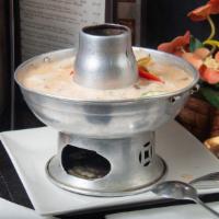 Tom Kah Chicken (Hot & Sour) · Mushrooms, vegetables, Thai herbs, spicy coconut milk soup.