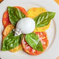 Caprese Salad · Heirloom tomatoes, burrata mozzarella, evoo, basil.