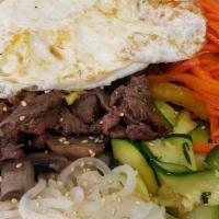 Bi Bim Bap · Korean rice bowl with veggies, egg, and choice of your protein and sauce.  *Substitute Rice ...