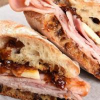 Turkey And Bacon Jam Sandwich · Roasted Turkey, Smoked Gouda and Bacon Jam with freshly baked Ciabatta.