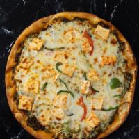Jain Pizza · Pizza with jain sauce, mozzarella, green peppers, all topped with tikka jain sauce.