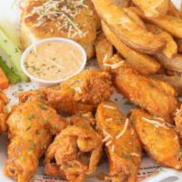 Jumbo Buffalo Wings By Pieces Combo · Comes with a biscuit, crispy fries and a drink.