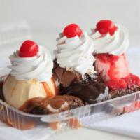 Brownie Split · Three toppings, whip cream, nuts and cherry.