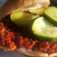 Nashville Hot Chicken · Hand breaded crispy chicken breast tossed in Nashville Hot sauce topped with house made brea...