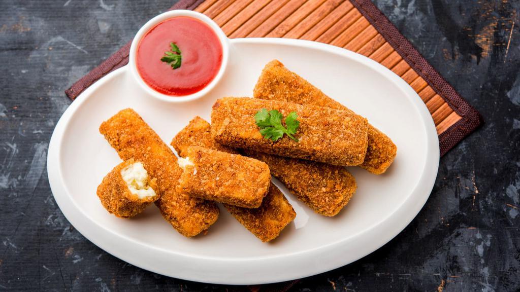 Cheese Pakoras · Delicately spiced fried cheese fritters.