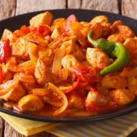Chicken Jalfrezi · Tender chicken pieces cooked in fresh vegetables, ground herbs and spices.