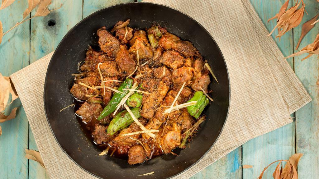Karahi Chicken · Boneless chicken cooked in the juice of garlic, ginger and tomatoes.