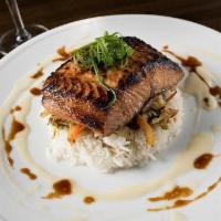 Red Miso Glazed Salmon · Miso marinated salmon served over white rice, sautéed Asian vegetables and a red miso butter...