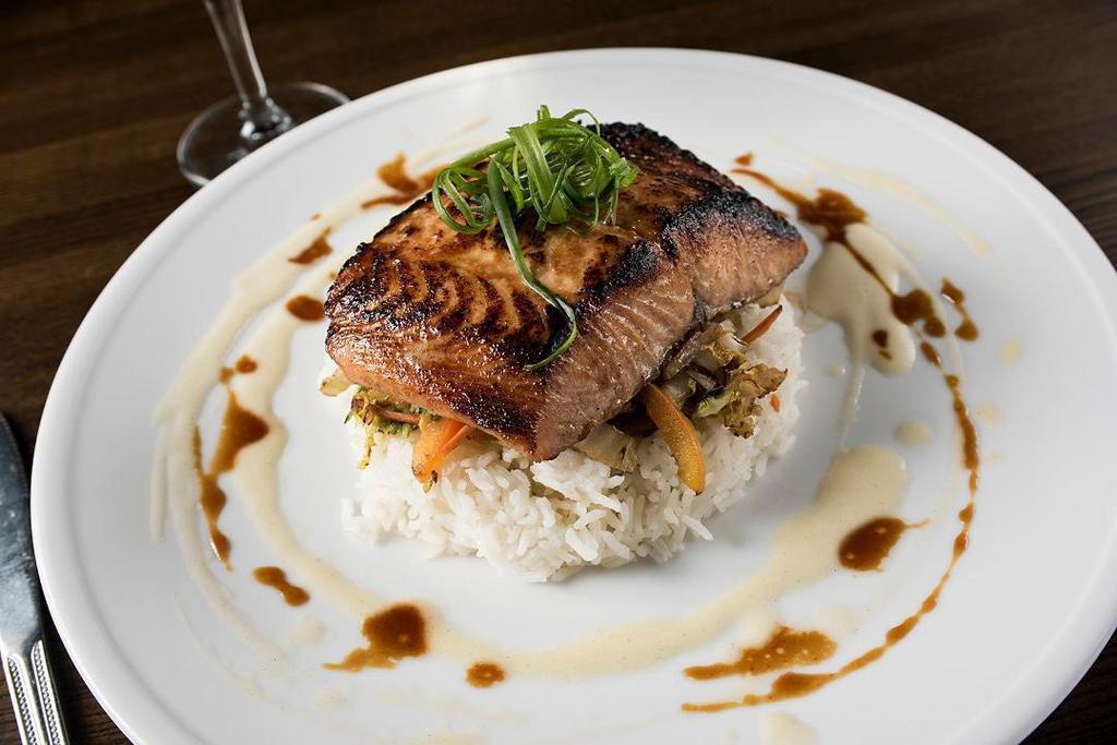 Red Miso Glazed Salmon · Miso marinated salmon served over white rice, sautéed Asian vegetables and a red miso butter sauce