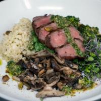 Keto Bowl · Grilled Angus beef Sirloin served over. a hearty mix of cauliflower “rice”, garlic-roasted b...
