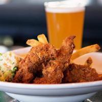 Chicken Tenders · Four tenders marinated in buttermilk, hand-bread and lightly fried. Served with French fries...