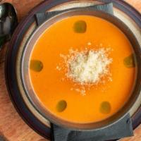 Tomato Basil Bisque Cup  · creamy tomato bisque soup, topped with parmesan and basil oil. Gluten Free