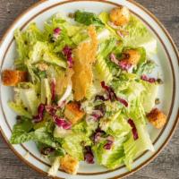 Caesar Half Salad · crisp romaine, radicchio, grated parmesan, garlic herb croutons, fried capers, parmesan cris...