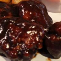 Boneless Wings · Tasty boneless wings smothered in mouth-watering sauces.