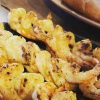 Shrimp Skewer · 10 pieces of shrimp grilled and seasoned with your choice of old bay, lemon pepper, Cajun, o...