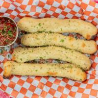 Bread Stix · Baked to golden perfection and topped with our signature white sauce and Parmesan cheese. Yo...