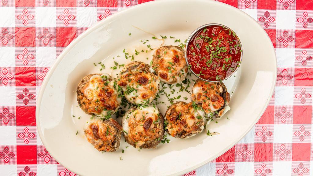 Stuffed Mushrooms · Tasty sausage, cheese, onion, garlic, oregano and other spices. Great for sharing!