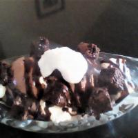 Brownie Sundae · Two scoops of your favorite ice cream topped with brownie bites and whip cream and drizzled ...