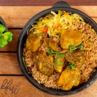 Curry Chicken With Rice And Peas · Chicken seasoned then sauteed and slowly cooked in a zesty curry gravy. Served with rice, ca...