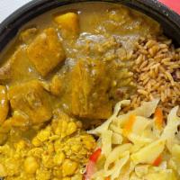 Curry Potato With Rice And Peas · Potatoes and chickpeas seasoned & sauteed with Caribbean herbs & spices, and slowly cooked i...