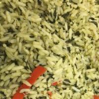 Spinach Rice Side Order · Chopped spinach & rice cooked together with coconut milk & Caribbean herbs & spices, onions ...