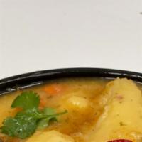 Oxtail Soup · Oxtails seasoned with Caribbean herbs & spices, cooked with potatoes, dumplings & carrots in...