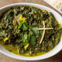 Saag Paneer · Fresh homemade Indian cheese gently cooked with garden spinach and mild spices.