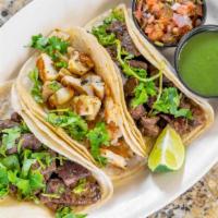 Grilled Tacos · Three pieces. Beef and  chicken.