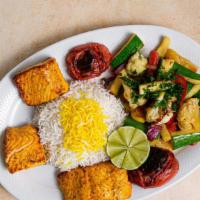 Salmon Kabob · Marinated filet of salmon with saffron rice and sauteed vegetables. Marinated in Yekta’s spe...