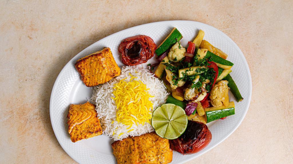 Salmon Kabob · Marinated filet of salmon with saffron rice and sauteed vegetables. Marinated in Yekta’s special spices and grilled to perfection.