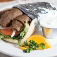 Gyros · Seasoned blend of beef and lamb. Broiled on the rotisserie and wrapped in pita bread with le...