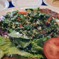 Make Own Falafel Salad · Fresh Falafel on top of fresh romaine and iceberg lettuce, tomatoes, cucumbers, feta cheese,...
