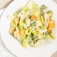 Side Caesar Salad · Romaine lettuce, parmigiano-reggiano, croutons.